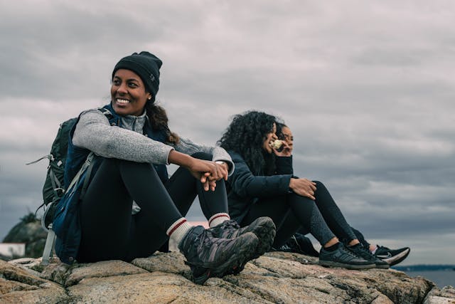 enjoying a healthy meal on the top of a cliff