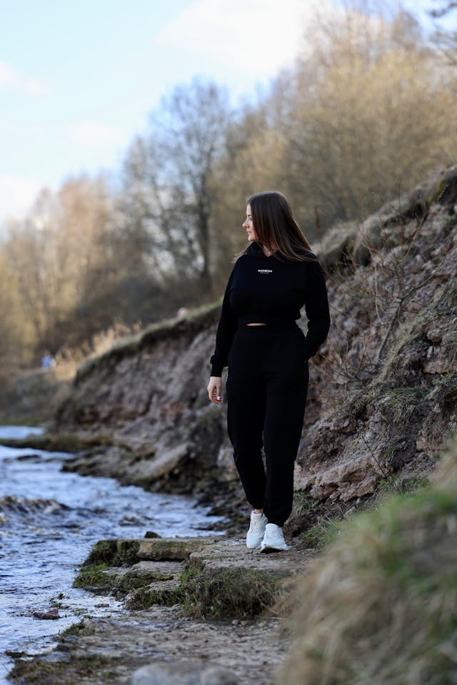 woman walking by the creek