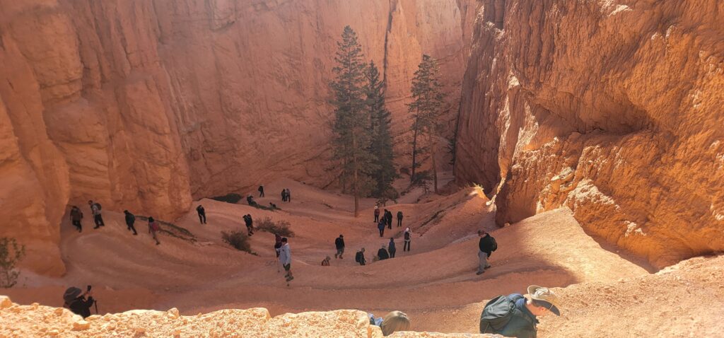 Overlook at the top of Bryce Canyon’s Queen’s Garden Trail with several hikers below