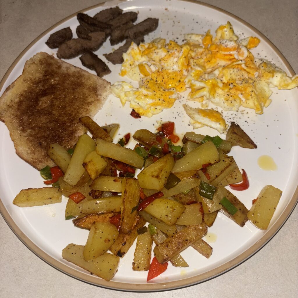 Leftover steak, scrambled eggs, homemade homefries with garden veggies &amp; sourdough cinn-sug toast.
