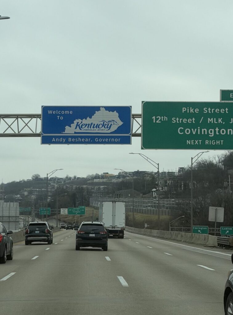 Kentucky state sign on interstate as we headed south on our road trip