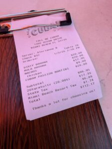 Receipt showing cost of meal in Miami Beach