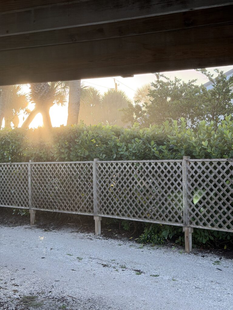 Lattice fence line at the beach
