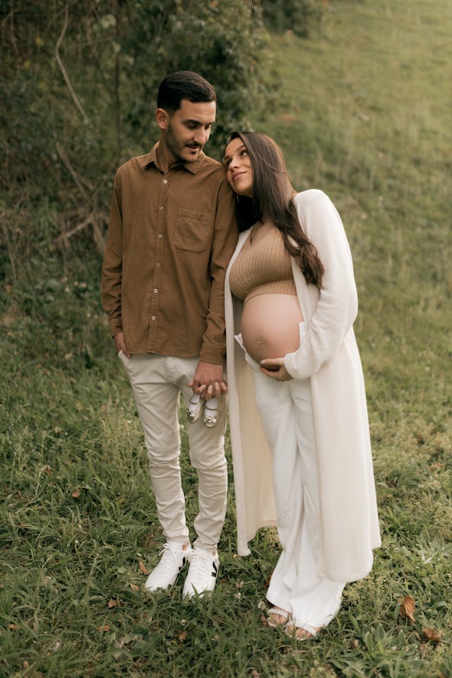 A young couple embracing their pregnancy journey.
