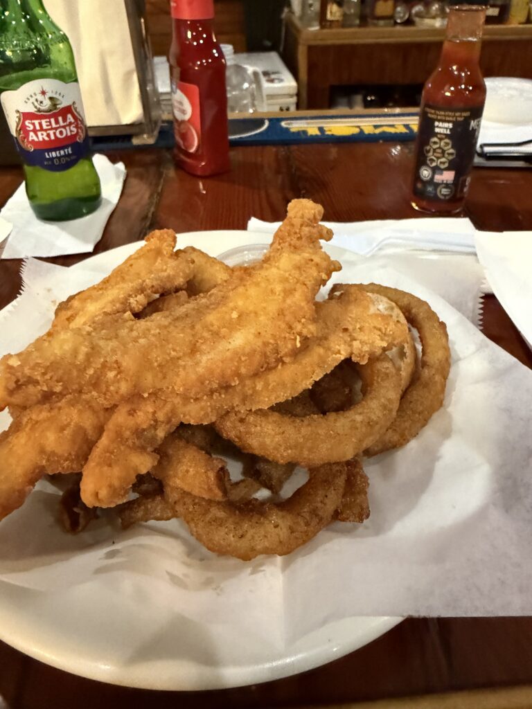 Fried food, stella artois and hot sauce