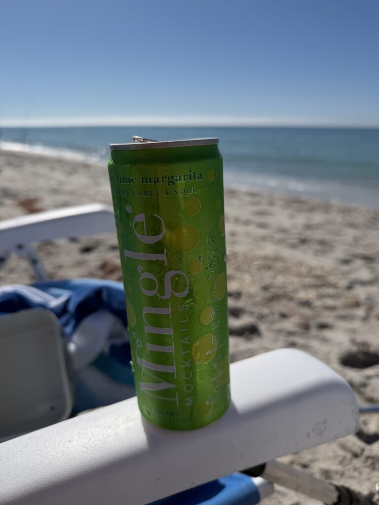 a can of Mingle on the beach chair